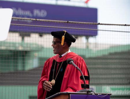 President Lee Pelton smiling after giving speech at Commencement 2021