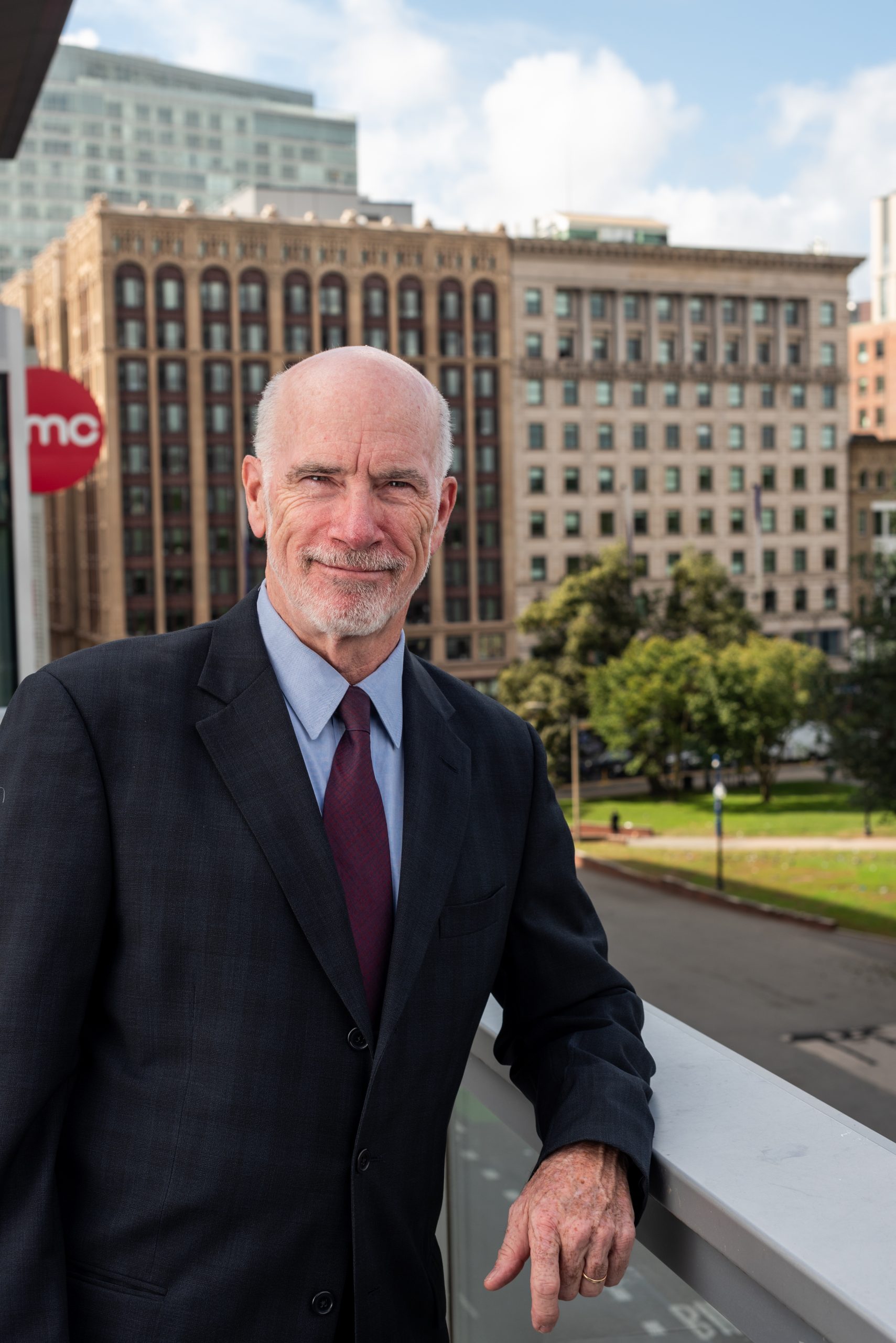 Portrait of Interim President Bill Gilligan standing in front of the Little Building