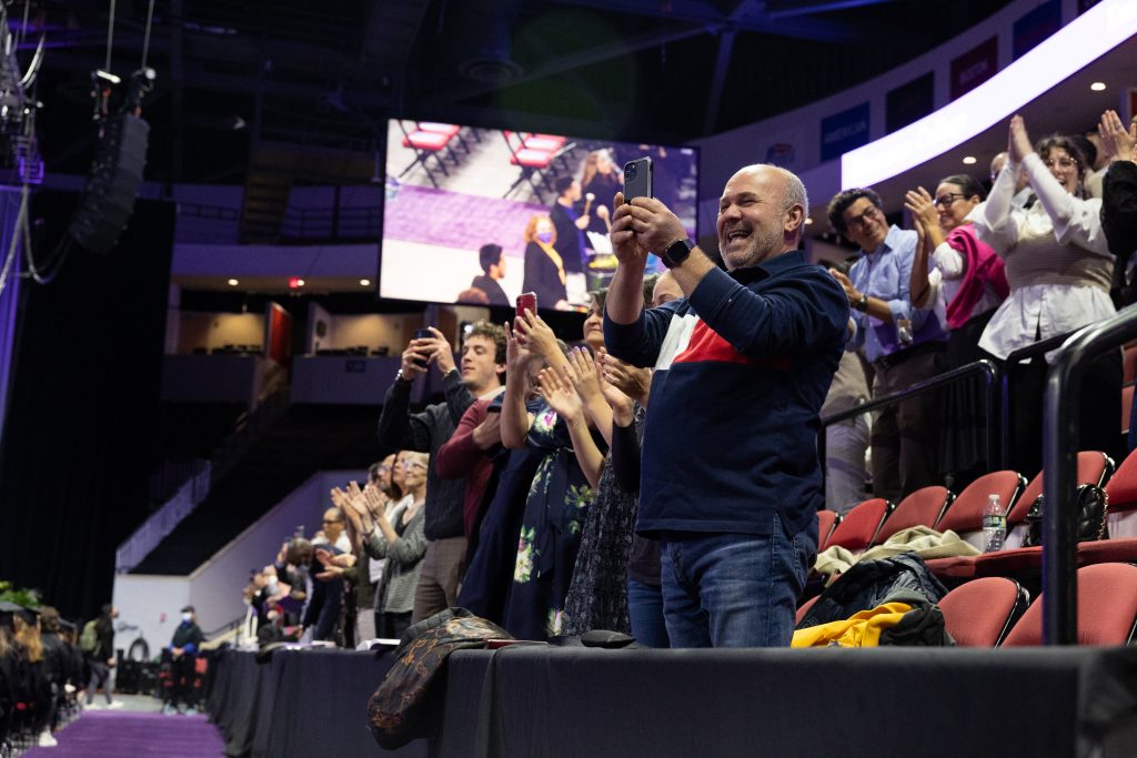 Audience members celebrate