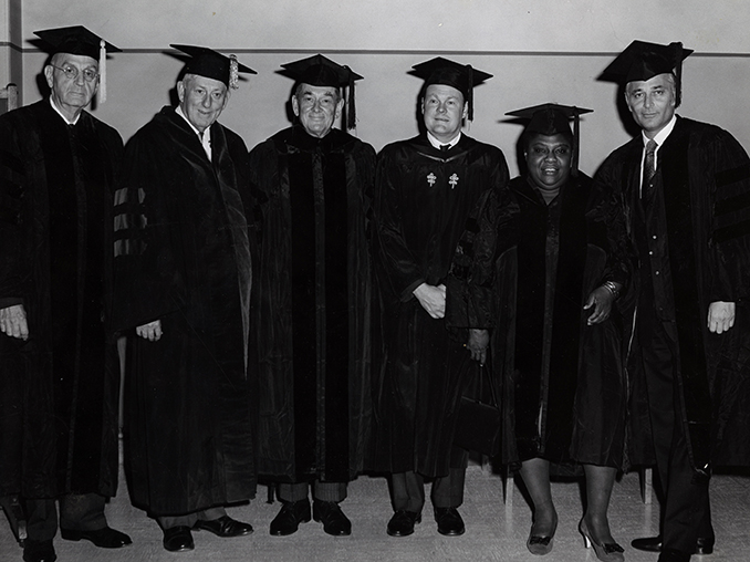 Norman Lear in a cap and gown with five other people when he received a honorary degree from Emerson in 1968