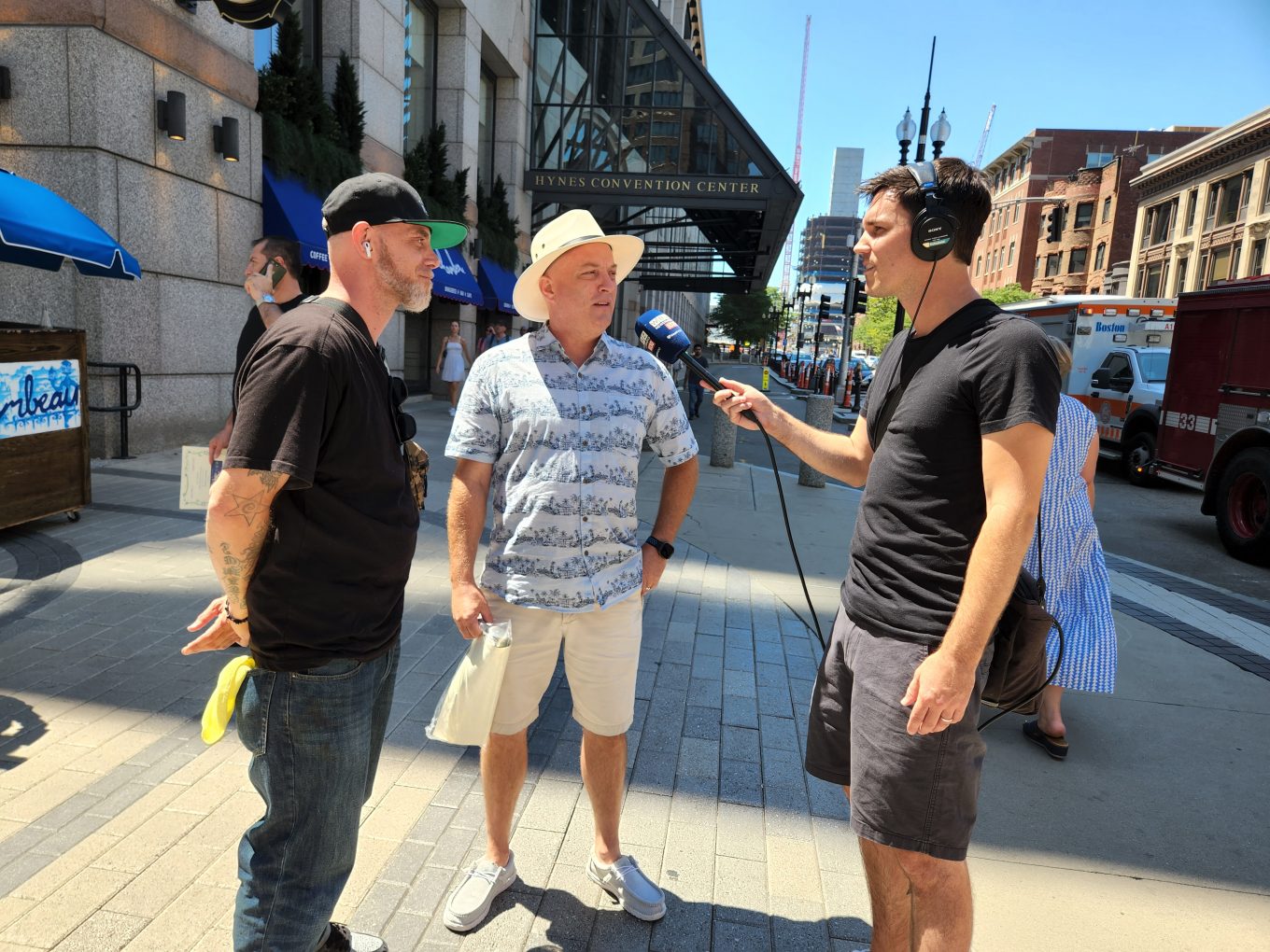 Matt Shearer interviews people on the street