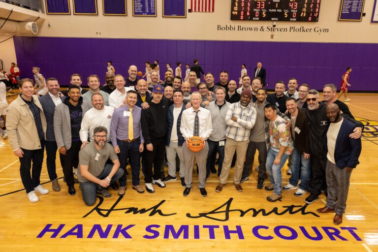 Hank Smith with many former Emerson student-athletes that played basketball for him